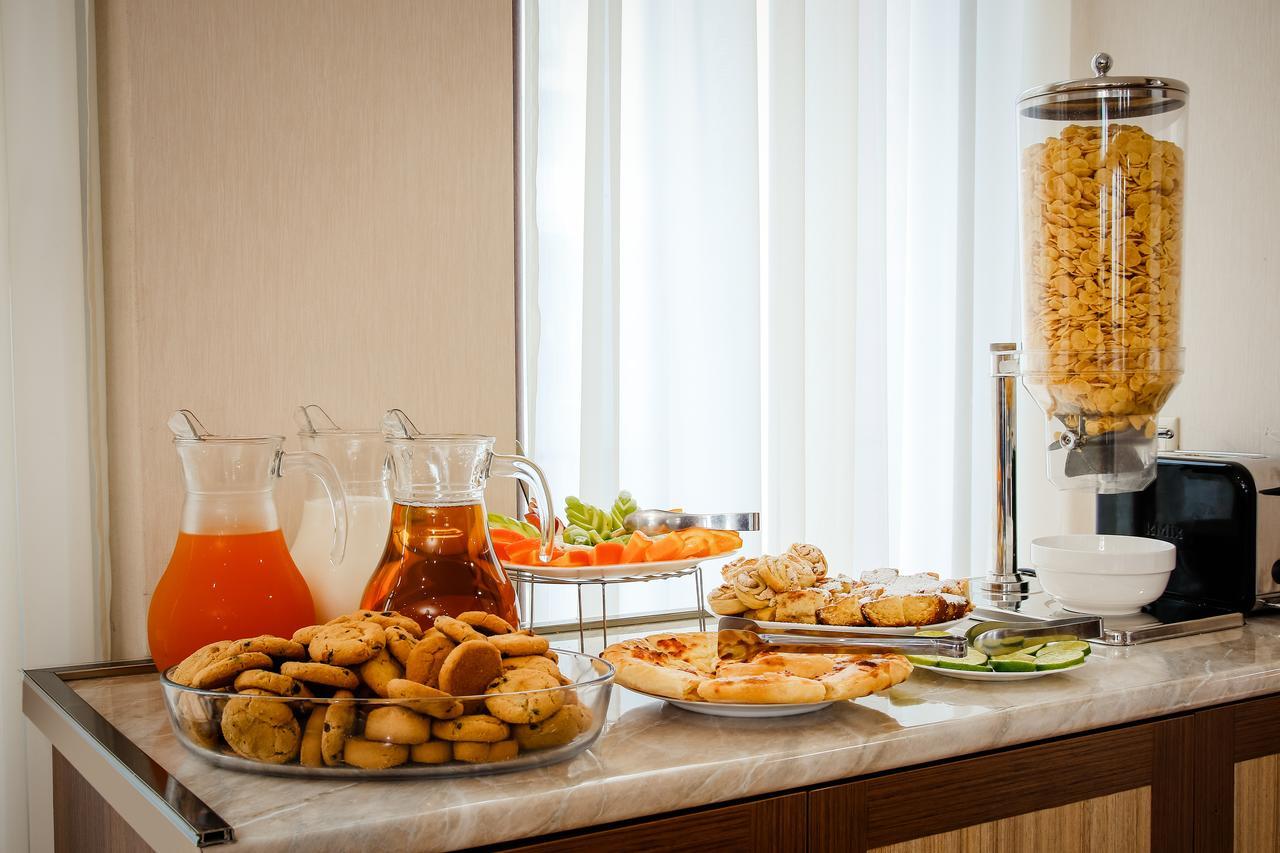 Gtm Plaza Hotel Tbilisi Bagian luar foto